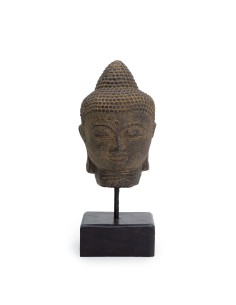 Tête de Bouddha reposée sur socle – Sérénité profonde